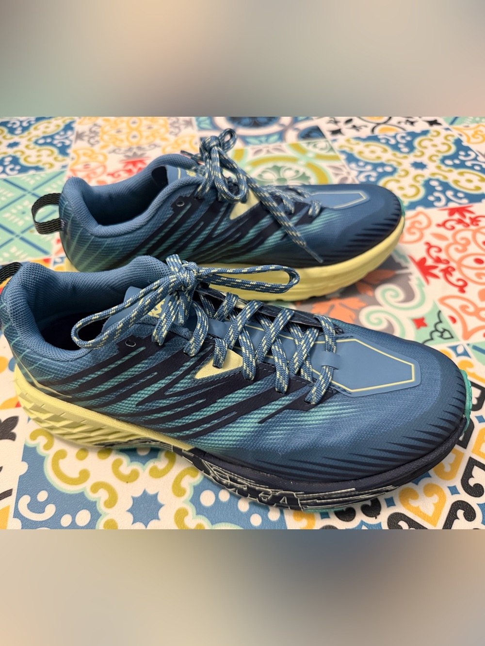 Hoka Women's Blue Athletic Shoes with Yellow Accents